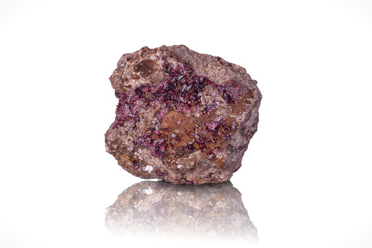 roselite on matrice. Specimen from Bou Azzer Mine, Morocco. photography isolated on white blackground. Specimen from . macro detail background. close-up mineral crystal unpolished