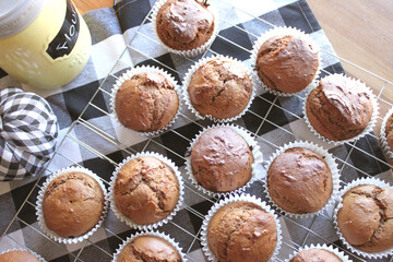 Fresh Baked Homemade Gingerbread Muffins with Buffalo Check and Sunflower Background