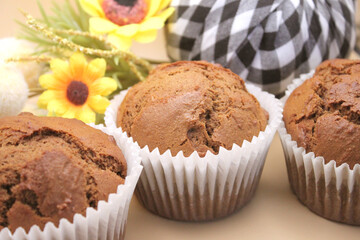 Fresh Baked Homemade Gingerbread Muffins with Buffalo Check and Sunflower Background