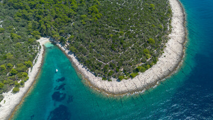 Fototapeta premium Aerial view of the blue lagoon of Losinj island on a sunny day