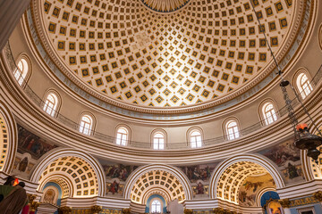 Fototapeta premium 23 Mar 2023. Malta, Mosta. The Sanctuary Basilica of the Assumption of Our Lady, or Rotunda of Mosta. Interior. View of the dome. Third-largest unsupported dome in the world.
