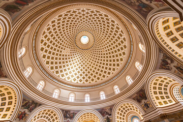 Obraz premium 23 Mar 2023. Malta, Mosta. The Sanctuary Basilica of the Assumption of Our Lady, or Rotunda of Mosta. Interior. View of the dome. Third-largest unsupported dome in the world.
