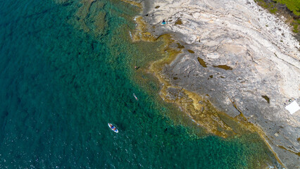 Aerial view of the rocky coast and crystal clear waters, Losinj Island, Croatia