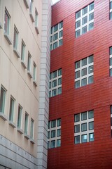 Vertical photo of two building walls joined at a corner