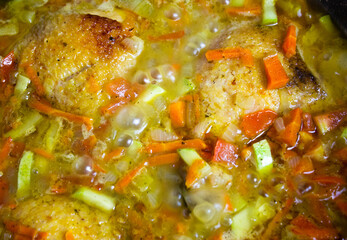 Stewing, stewing chicken, chicken with vegetables. Chicken and vegetable stew, cooking.