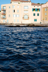 Walking in Saint-Tropez famous touristic village on French Riviera, summer vacation, colorful...