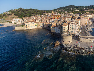 Fototapeta premium Aerial view on bays, beaches, old colorful houses of famous Saint-Tropez town on French Riviera, Var, Provence, France, summer vacation destination