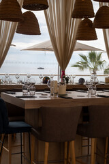 Sandy beach in Monaco, Monte-Carlo Lavrotto beach with clear sea water and beach cafe and restaurants