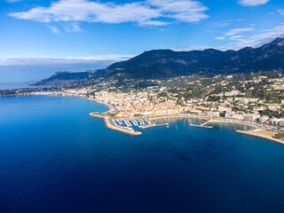 Aerial view on French Riviera, Menton and Mediterranean Sea as seen from French-Italian border in Grimaldi village, Ventimiglia, travel destination, panoramic view from above