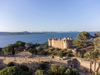 Obraz premium Aerial view on bay, hills,, old citadel fort, olorful houses of famous Saint-Tropez town on French Riviera, Var, Provence, France, summer vacation destination