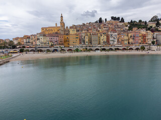 Aerial view on French Riviera, colorful Menton old city and marina on Mediterranean Sea near French-Italian border, travel destination, panoramic view from above