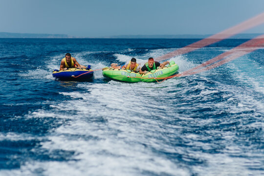 Exciting speedboat tubing adventure in the sea during summer