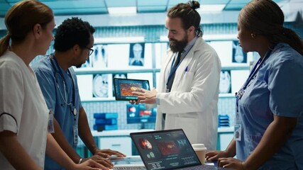 Healthcare professionals attending a strategy meeting in a medical center, focusing on treatment plans for disease prevention. General practitioner exploring healthcare initiatives. Camera B.