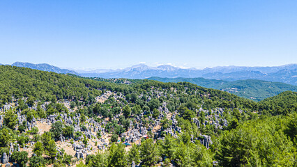 The area of conglomerates of rocks surrounding the ancient city of Selge in Antalya. The area called Avatar Land, named Rocks of Man, because it resembles a standing person, creates a fantastic image.