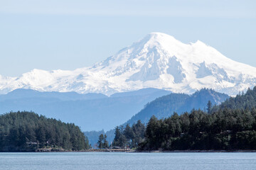 Panoramic view of Puget Sound and the snow-capped North Cascades with Mount Baker seen from a ferry. © Ute Sonja Medley