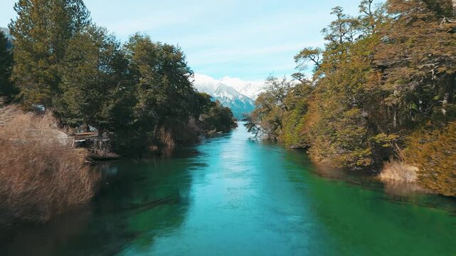 Tranquil River Flowing Through Lush Forest in Patagonia Argentina. Ruca Malen River in Villa la angostura, Neuquen, Argentina 