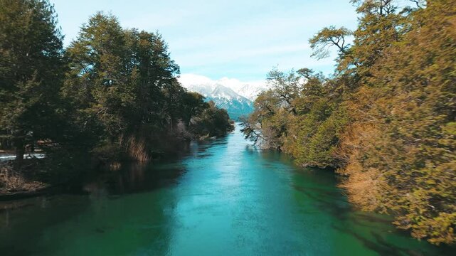 Tranquil River Flowing Through Lush Forest in Patagonia Argentina. Ruca Malen River in Villa la angostura, Neuquen, Argentina 