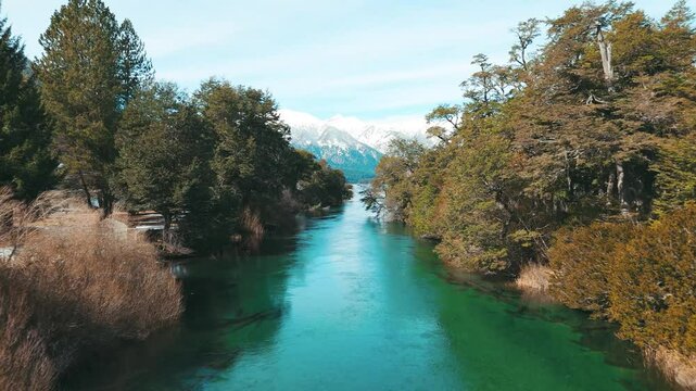 Tranquil River Flowing Through Lush Forest in Patagonia Argentina. Ruca Malen River in Villa la angostura, Neuquen, Argentina 