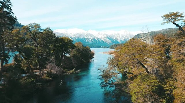 Tranquil River Flowing Through Lush Forest in Patagonia Argentina. Ruca Malen River in Villa la angostura, Neuquen, Argentina 