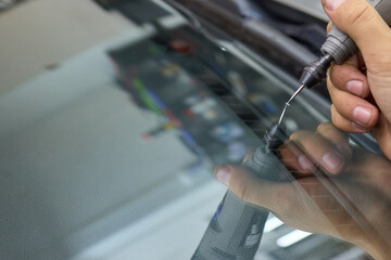 Installing windshield on a car with automotive design