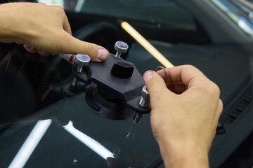 Installing windshield on a car with automotive design