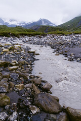 River and mountain landscape in Glacier Bay National Park in southeastern Alaska during summertime