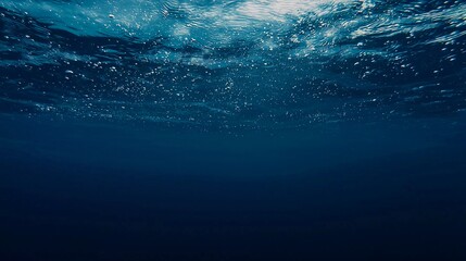 Dark blue ocean surface seen from underwater which is very beautiful