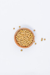 Yellow soybeans on an isolated white background, soybeans are the basic ingredient of milk and tofu