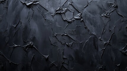 A vintage-inspired wall texture featuring a dark black cement pattern. Black wall with an antique, worn surface in a retro design with rich charm.