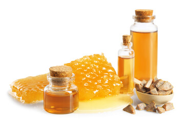 Natural honey tincture, propolis granules and sweet honeycomb isolated on white
