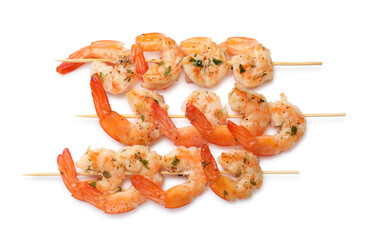 Skewers with delicious grilled shrimps isolated on white, top view