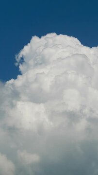 Vertical video of a thunder clouds rising, high qualitative time lapse, no flicker.