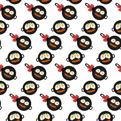 2 pans with handles with scrambled eggs and sausage with ketchup strip in shape of smiling emoticon