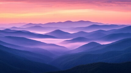 Fototapeta premium Serene Purple Mountains at Sunrise with Misty Layers and Pink Sky.