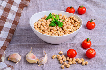 Chickpeas and Cherry Tomatoes on Kitchen Cloth