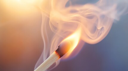 A close-up of swirling smoke from a burning matchstick, focusing on the delicate and ephemeral nature of the smoke.