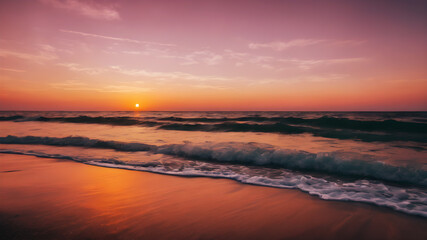 Obraz premium A serene sunset over a calm ocean with soft pink and orange hues
