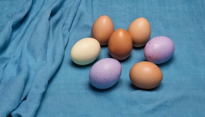  Vibrant Easter eggs on a blue cloth