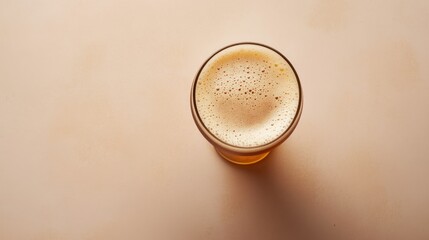 A flat lay of a Belgian trappist beer in a chalice glass, with space for copy text.