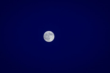 Background with moon and dark blue sky with copy space