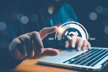 Trusted partner. Trustworthy collaboration, company or contract. Confidence to work together. Businessman turning knob to highest trust levels. Build trust in business and finance relationships.