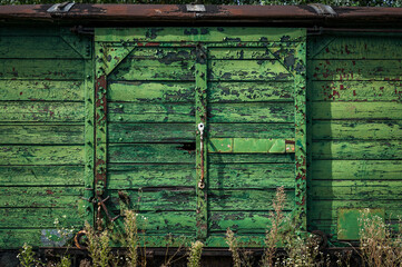 Rusted and worn doors of an old railway wagon