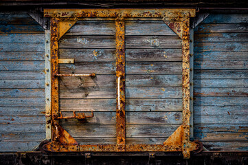Rusted and worn doors of and old railway wagon