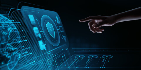 Hand touching a digital virtual screen with a shield icon. Cyber Security and Data Protection...