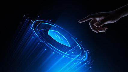 Hand touching a digital virtual screen with a shield icon. Cyber Security and Data Protection...
