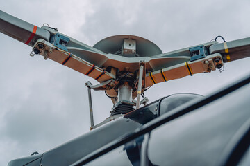 Close up of a helicopter rotor head and blades © HiroSund