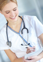 Documents, medical and smile with nurse woman in hospital for healthcare insurance, notes or results. Checklist, compliance and writing with happy medicine professional in clinic for administration