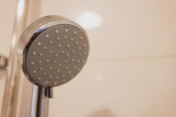 Chrome clean shower head in the bathroom. Modern shower