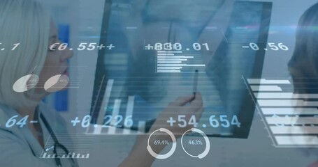 Financial data and statistics animation over medical professional analyzing X-ray - Powered by Adobe