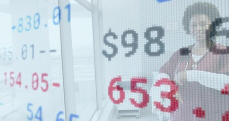 Financial data animation over diverse business people in modern office